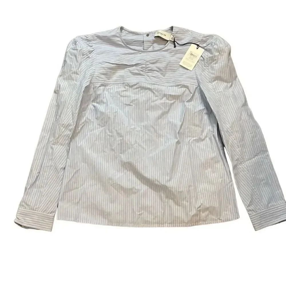 Draft Listing Coach blue striped shirt with buttons down back size 2. New with t